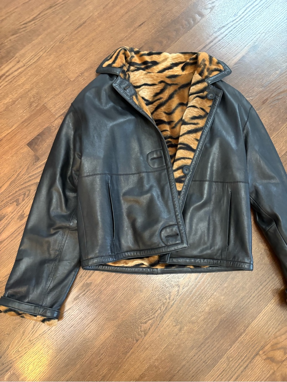 Never worn danier Leather Jacket REVERSIBLE with Tiger-Print side